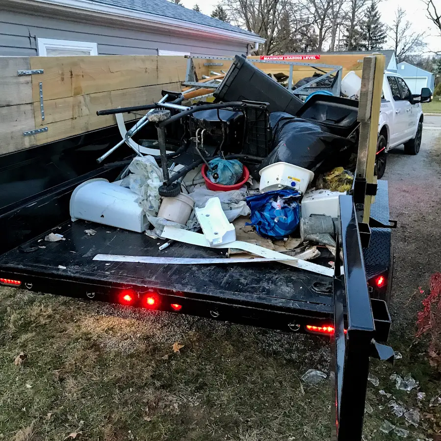 Roll-off dumpster delivered to a residential driveway in Ellenton